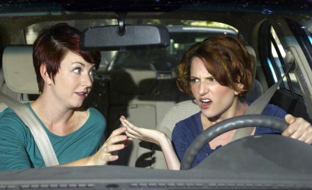 annoying female passenger by being a "backseat driver"の写真素材