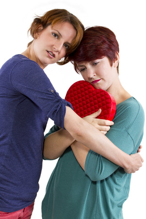 consoling a friend suffering from a broken heart の写真素材