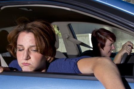 close up of passenger woman being car sick