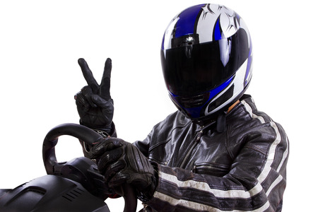 race car driver wearing protective leather and helmetの写真素材