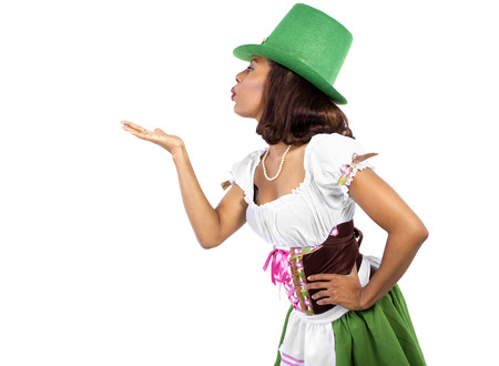 african american waitress dressed in st patricks day costumeの写真素材