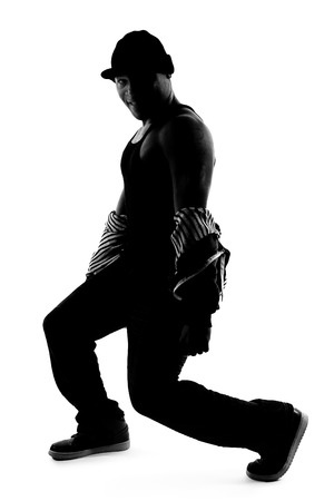 Black and white silhouette of a male dancer posing with dance movesの写真素材