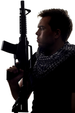 Silhouette of a model as a homesick soldier or veteran suffering from PTSDの写真素材