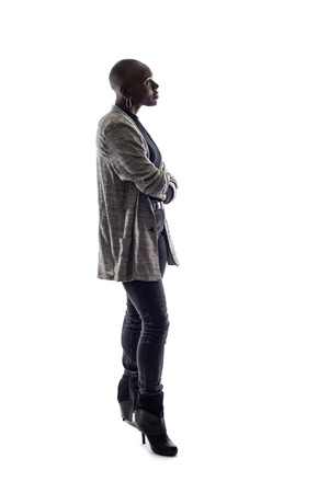 Black female African American model on a white background.  She is posed with a sad or depressed postureの写真素材