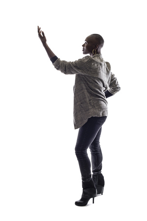 Black female African American model on a white background.  She is speaking or acting like an actress or a businessperson or political candidateの写真素材