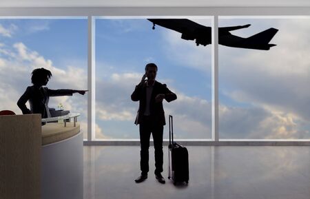Stressed out businessman passenger arguing with a flight attendant or receptionist at an airport check in counter.  He is angry because of a delayed or cancelled flight.の写真素材