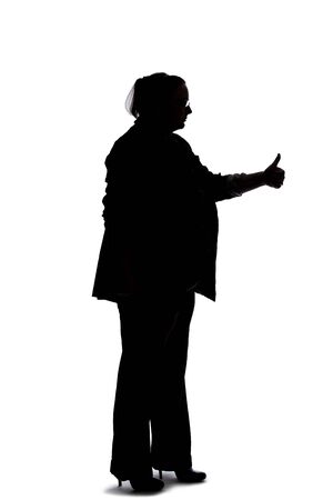 Silhouette of a curvy or plus size businesswoman on a white background.  She is holding her hand in a thumbs up gesture.の写真素材