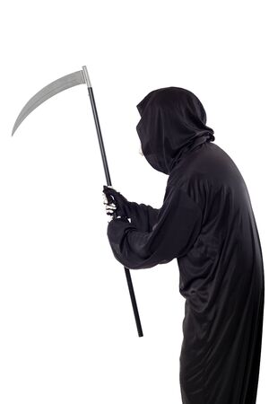 The grim reaper or death halloween costume isolated on a white background.  The skeleton is wearing a hooded black robe. Side view in profile for composites.の写真素材