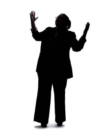 Silhouette of a curvy or plus size businesswoman on a white background for composites.  She is posed like she is angryの写真素材