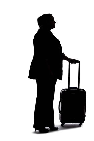 Silhouette of a curvy or plus size businesswoman on a white background for composites.  She is waiting patientlyの写真素材