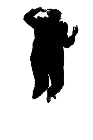 Silhouette of a curvy or plus size businesswoman on a white background for composites.  She is jumping or leapingの写真素材