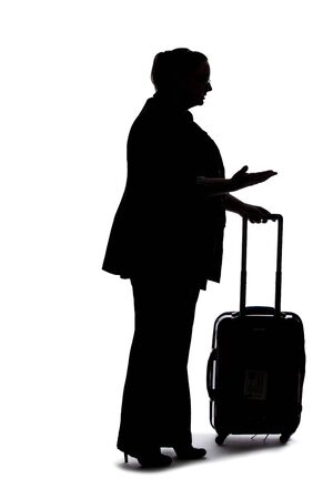 Silhouette of a curvy or plus size businesswoman on a white background for composites.  She is waiting patientlyの写真素材