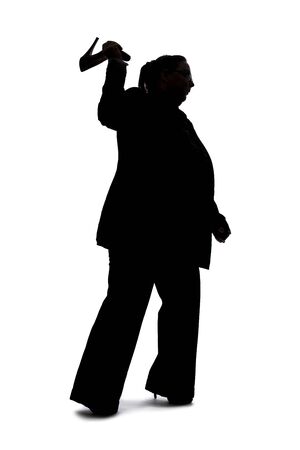 Silhouette of a curvy or plus size businesswoman on a white background for composites.  She is hitting something with heels of shoesの写真素材