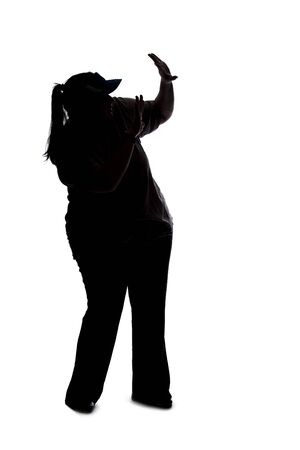 Silhouette of a curvy or plus size woman on a white background.  She is unrecognizable holding hands up as a stop gestureの写真素材