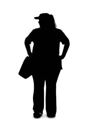 Silhouette of a curvy or plus size woman on a white background.  She is unrecognizable and standing or waitingの写真素材