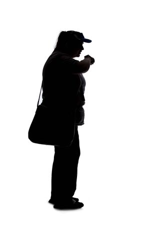 Silhouette of a curvy or plus size woman on a white background.  She is checking the time or schedule on a smartwatchの写真素材