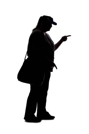 Silhouette of a curvy or plus size woman on a white background.  She is unrecognizable expressive with hands as if talking to someoneの写真素材