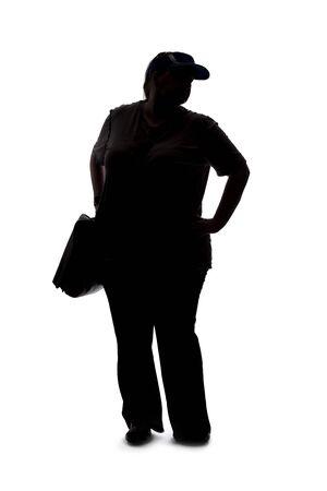 Silhouette of a curvy or plus size woman on a white background.  She is unrecognizable and standing or waitingの写真素材