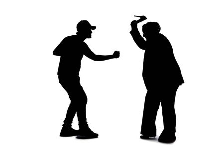 Silhouette of anonymous people on a white background fighting and being rude.  They are expressing anger with violence and confronting in an aggressive mannerの写真素材