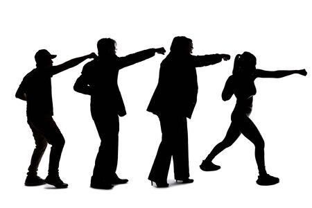 Silhouette of a group of people punching.  The crowd is isolated on a white background and the models are unrecognizable and anonymous. の写真素材