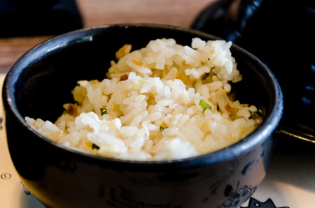 Japanese Garlic Rice in the Black Bowlの写真素材
