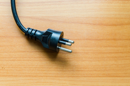 Plug on the table backgroundの写真素材