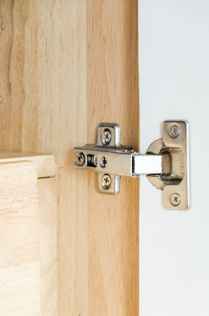 Stainless Steel Hinge in Cupboardの写真素材