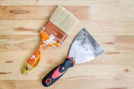 Lute and Paintbrush on the Wooden Background