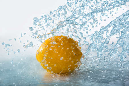 splash of water on lemon