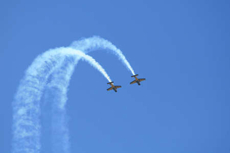 Aerobatic team with smoke trailsの写真素材