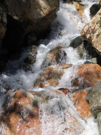 The waters of a mountain streamの写真素材