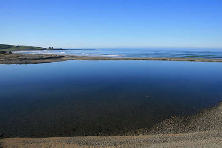 Where the river meets the sea, Kakanui, New Zealandの写真素材
