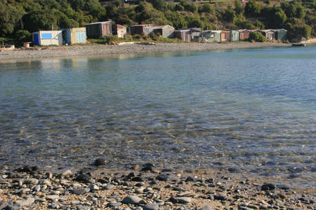Beach huts by the riverの写真素材