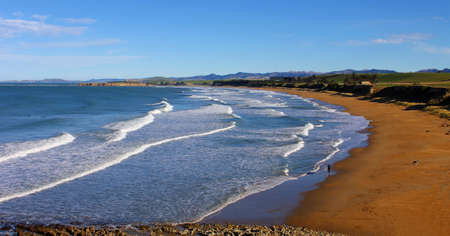 Sweeping beach vista, Otago, New Zealandの写真素材
