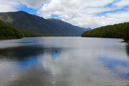 Across lake to mountainsの写真素材
