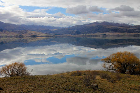 Across lake to mountainsの写真素材