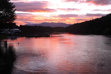 Sunrise (sunset) over Waiau River, New Zealandの写真素材