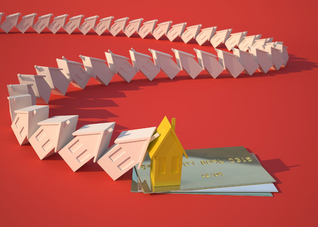 Real estate and gold credit card. Conceptual economic illustration about real estate, investments and finance crisisの写真素材