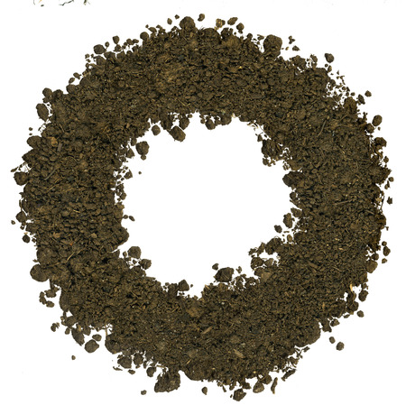 Alphabet made of brown soil on white background. High sharp and detail. Letter Oの写真素材