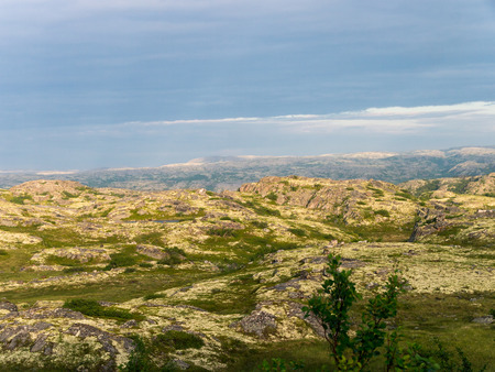 Plateau under cloudy sky: northern mountain landscapeの写真素材
