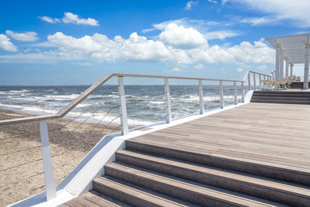 Wood deck extending to the seaの写真素材