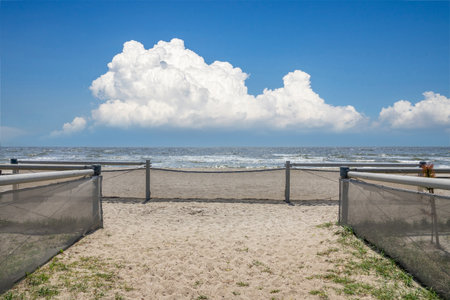 Blue sea and white cloud beachの写真素材