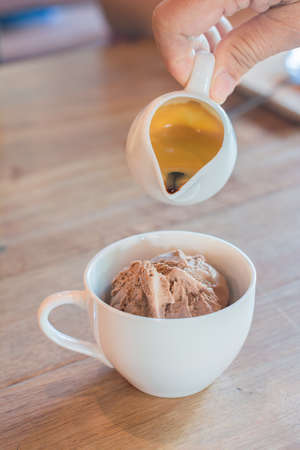 affogato and ice cream on wood tableの写真素材