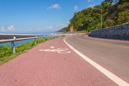 Beautiful of bicycle lane along the sea, Chanthaburi,Thailandの写真素材