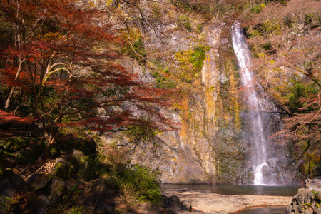 Autumn leaves and waterfalls in Arashiyama, Kyotoの写真素材