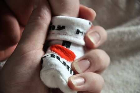 Beautiful cute baby feet in socks
