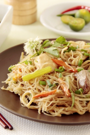 Spicy fried noodles an oriental food cuisineの写真素材