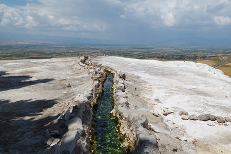 Travertine pools and terraces in Pamukkale. / Pamukkale, a natural site in Denizli in southwestern Turkey.の写真素材