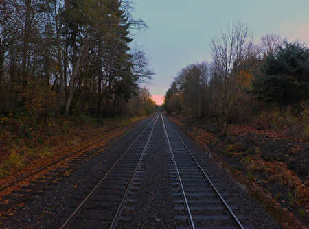 Sun Setting on Railroad Tracks