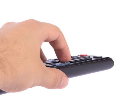 TV remote control in handの写真素材